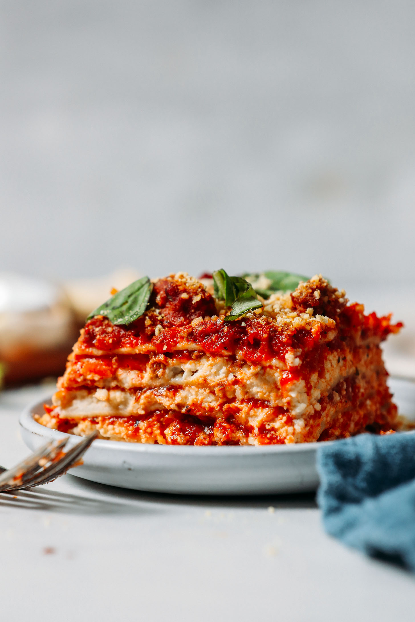 Fork resting next to a plate of Dairy Free Gluten Free Lasaga