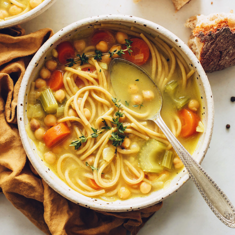 Vintage spoon in a bowl of Chickpea Noodle Soup