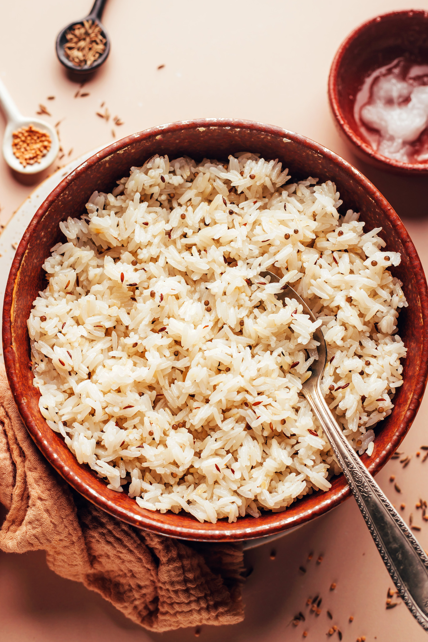 Bowl of fluffy vegan jeera rice made in the Instant Pot