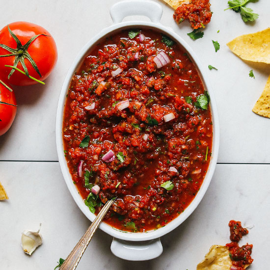 Ceramic dish filled with a batch of our Easy Red Salsa recipe