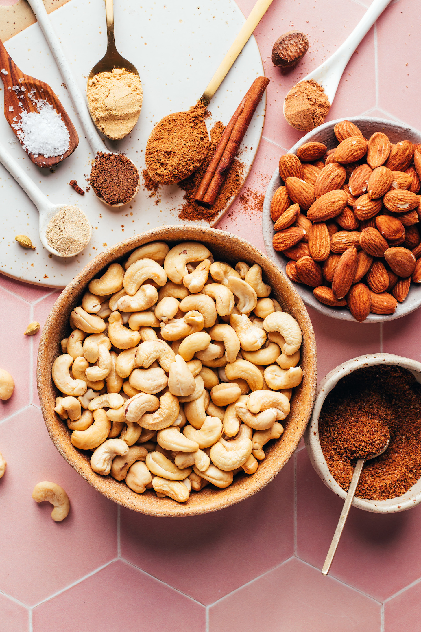 Cashews, almonds, coconut sugar, spices, and salt