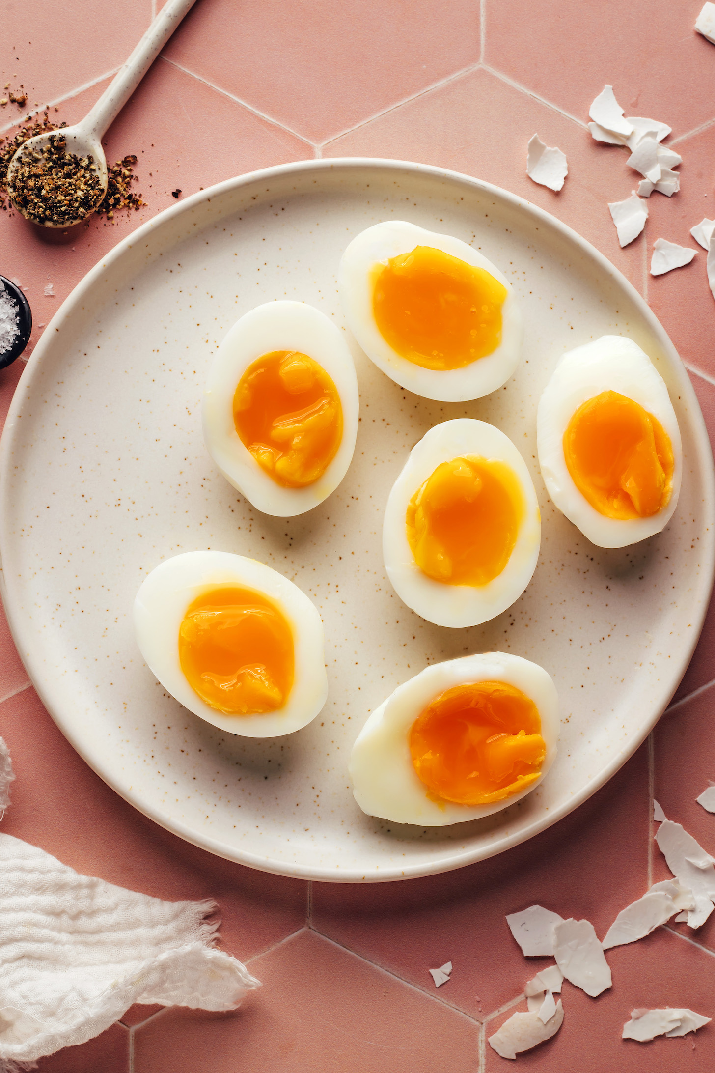 Plate of jammy eggs with perfectly set whites and jammy centers