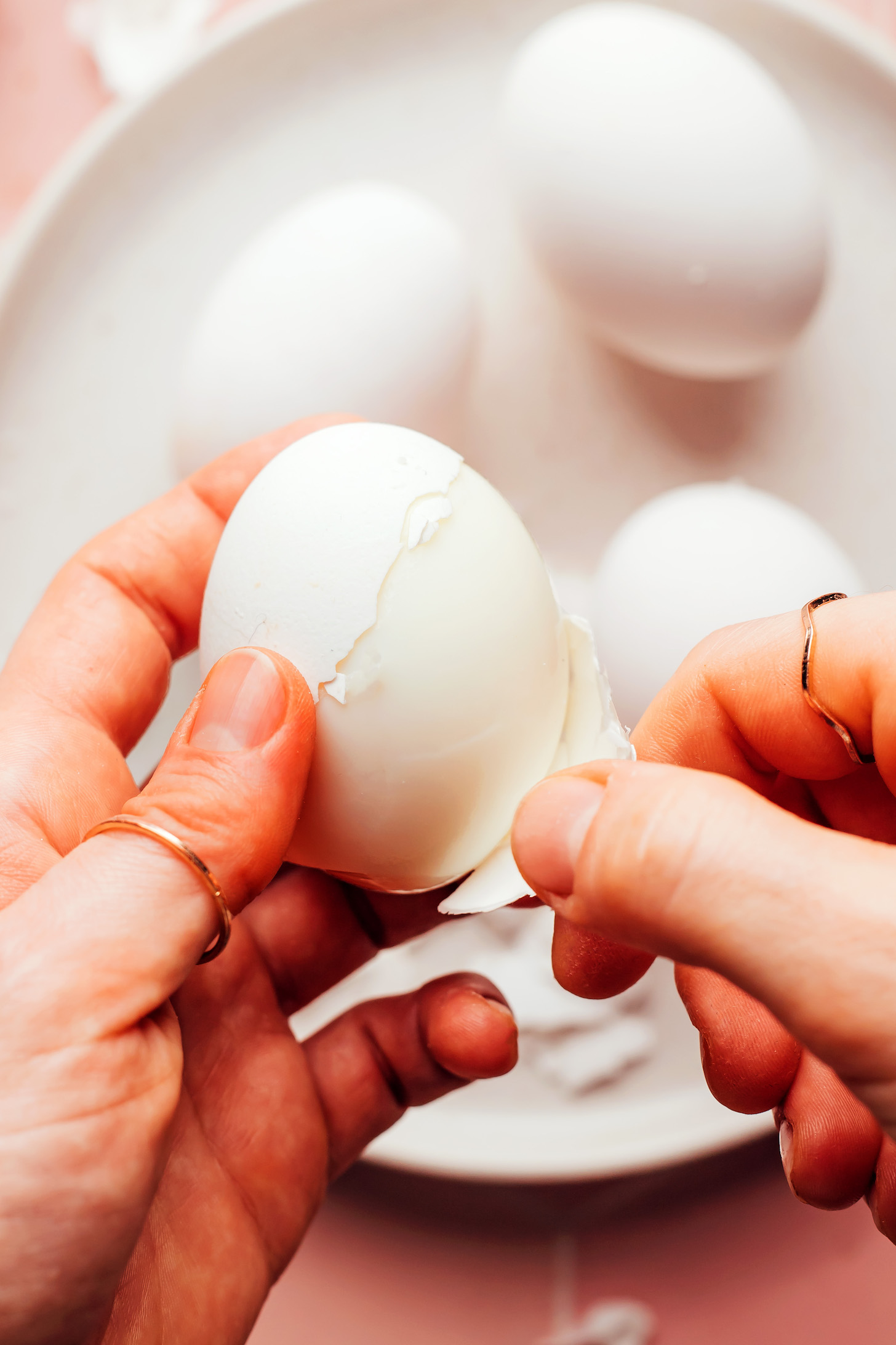 Peeling the shell from an egg