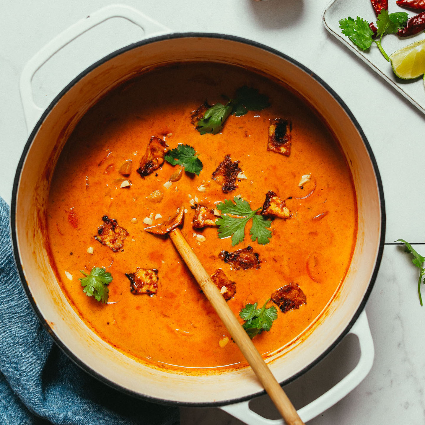 Wooden spoon in a pot of homemade Massaman Curry