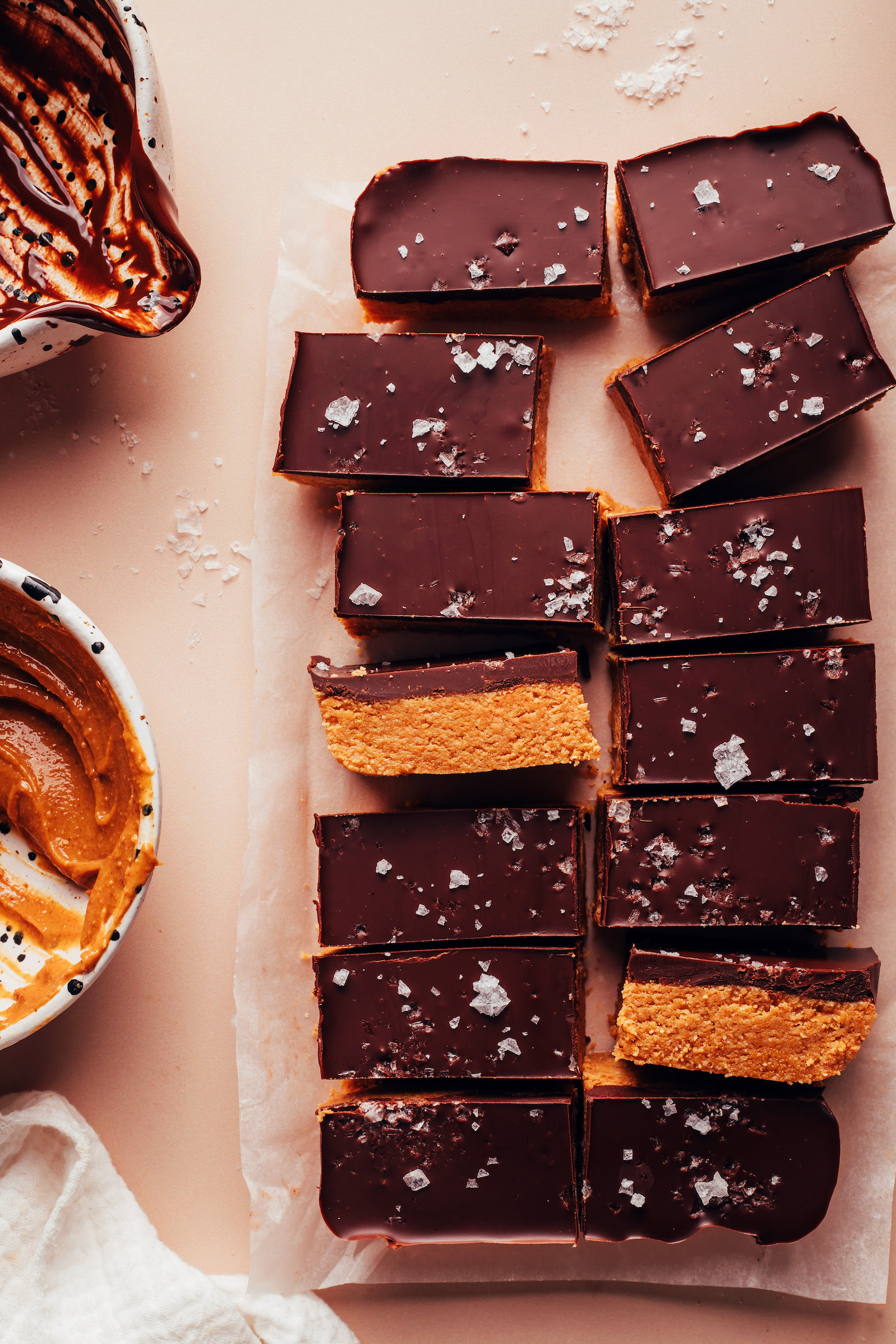 No-bake chocolate peanut butter bars on a piece of parchment paper