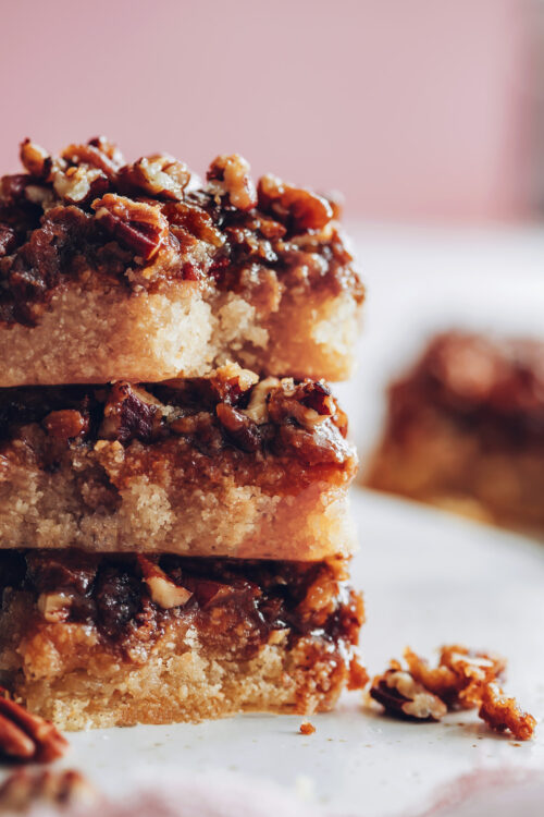 Stack of vegan and gluten-free pecan pie bars