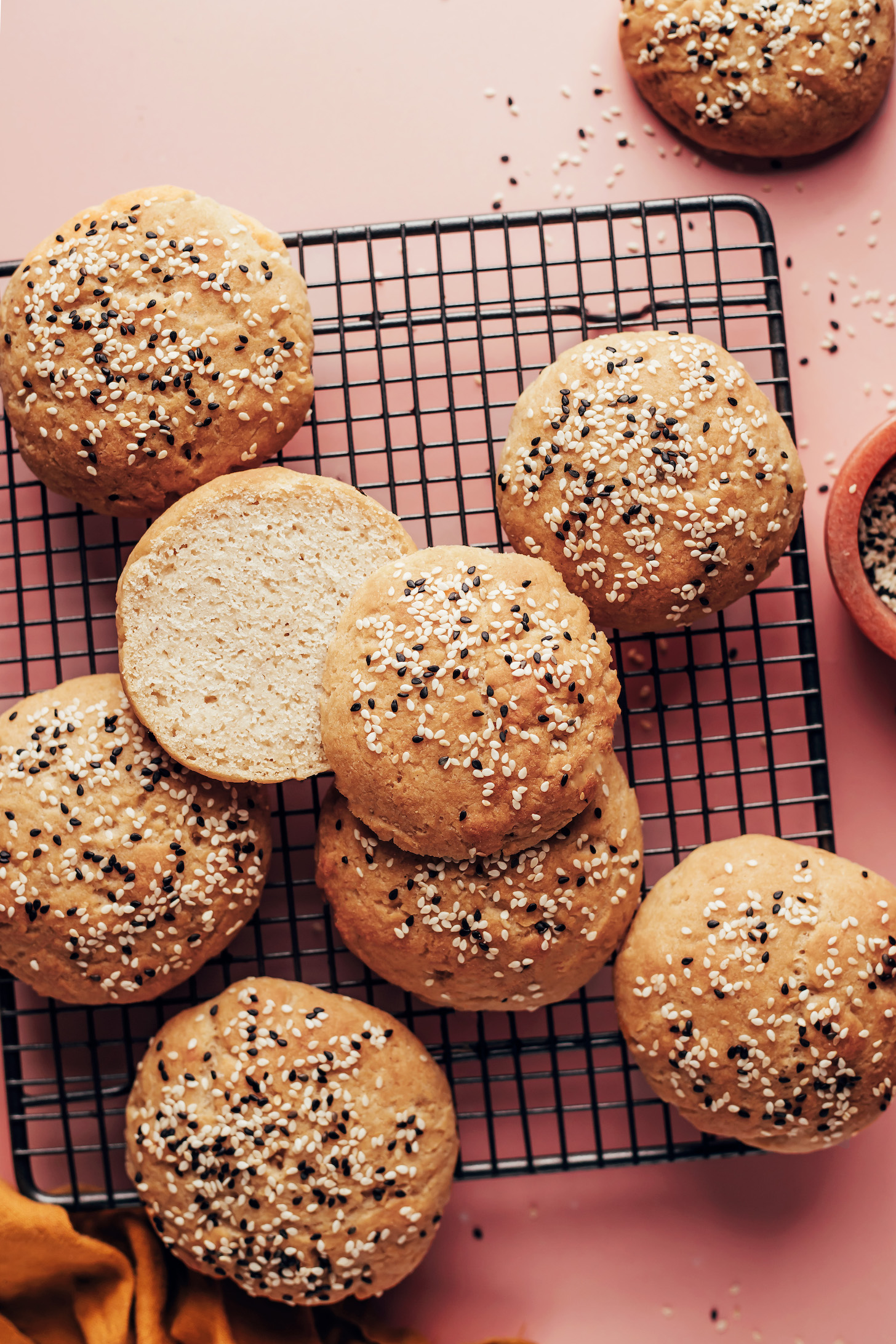 Vegan gluten-free hamburger buns on a cooling rack